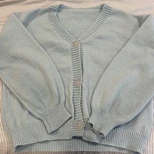 Light blue cardigan sweater